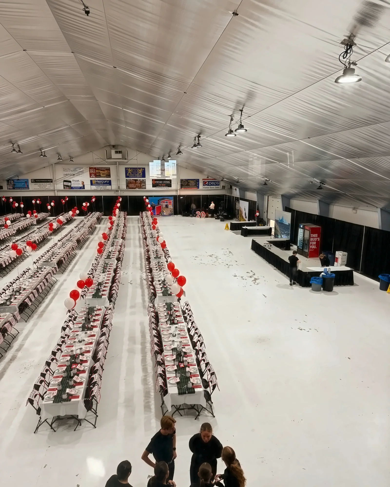 Fireside Catering staff with a large hall set for a catered dinner event in Newfoundland