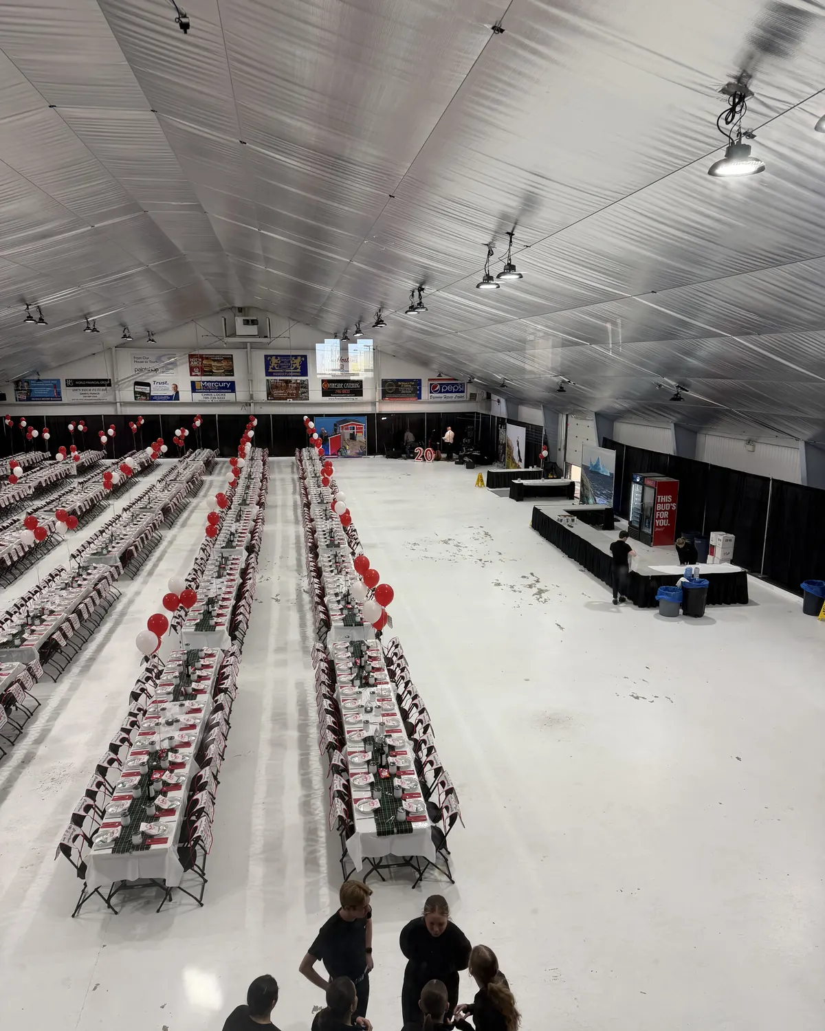 Fireside Catering staff with a large hall set for a catered dinner event in Newfoundland